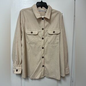 corduroy button-up shirt jacket in a light beige or cream color